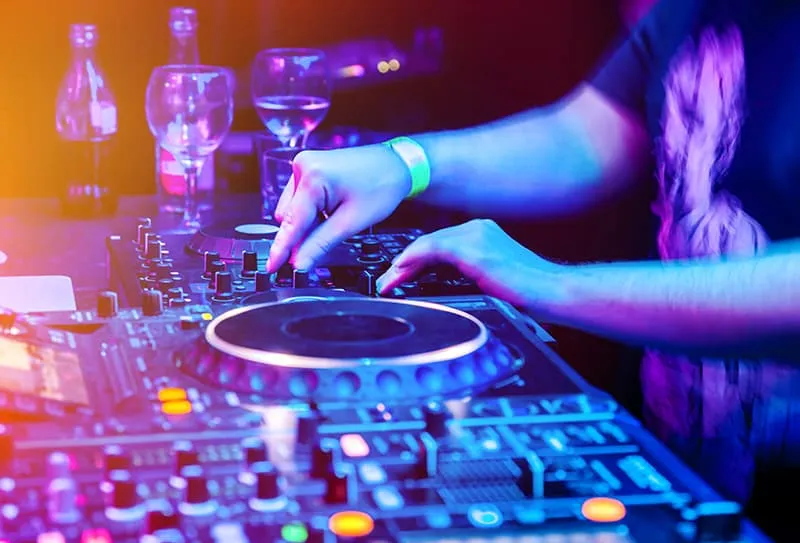 DJ playing in a nightclub.