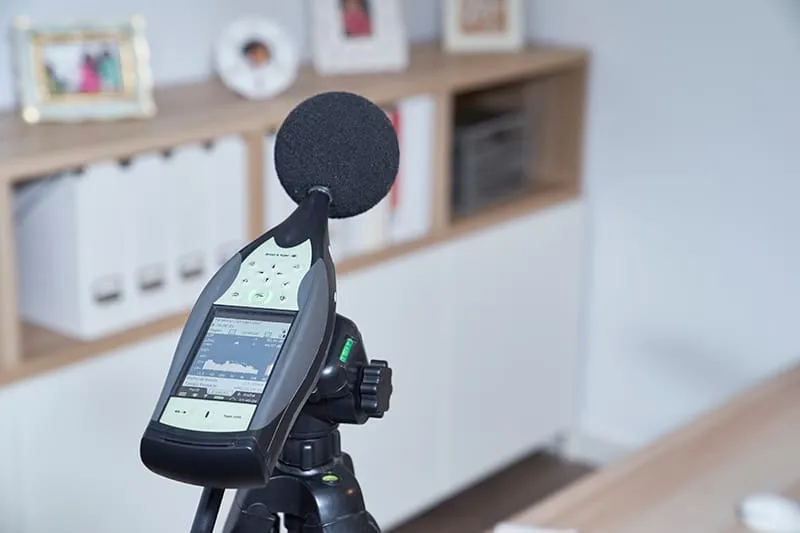 Sound pressure level meter set up in an office.