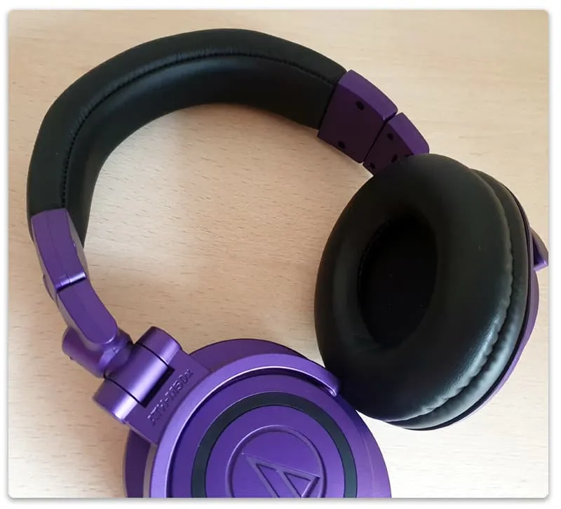 Photo of a pair of headphones with thick ear padding.