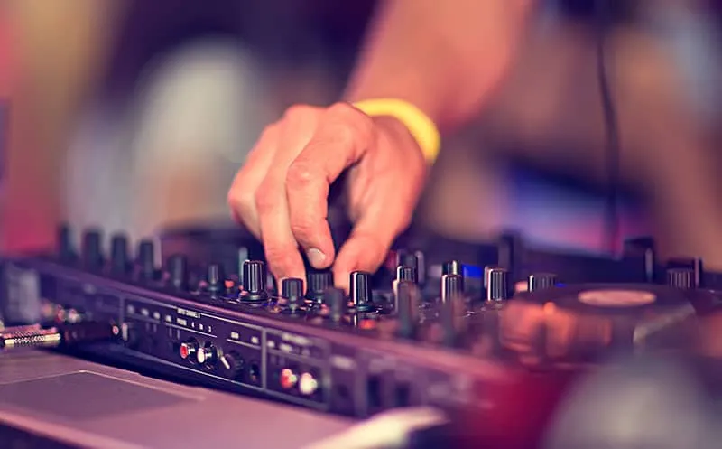 DJ mixing on a DJ controller.