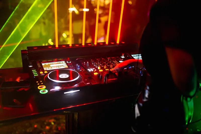 DJ performing in a nightclub.
