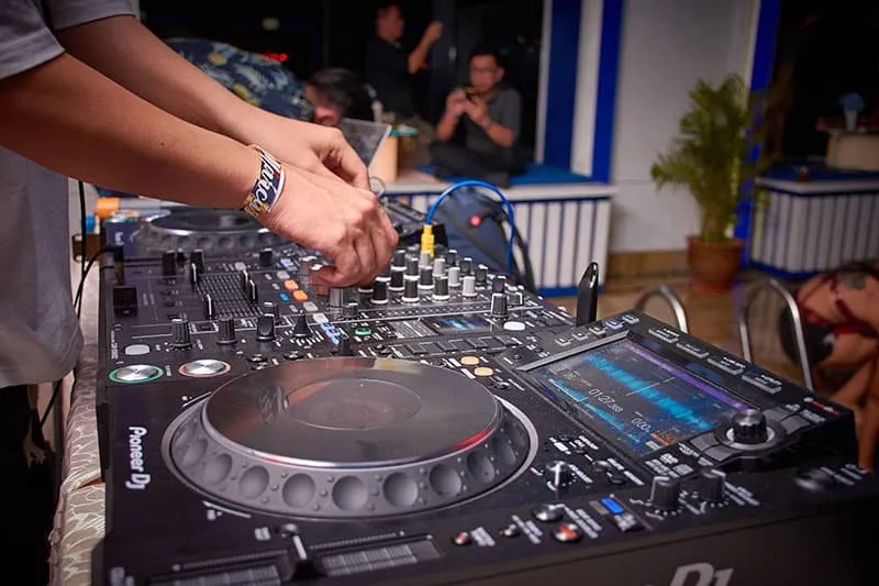 DJ playing at a house party