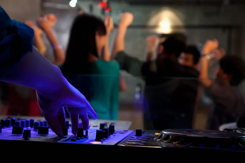 DJ performing at a small party.