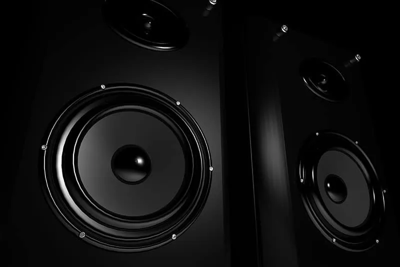 Close up photo of two studio monitors.