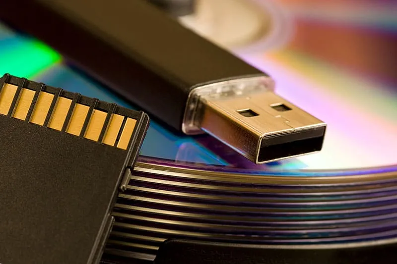 Photo of CDs, USB and SD card.